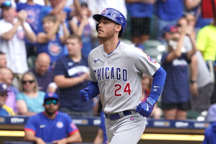 Jul 6, 2023; Milwaukee, Wisconsin, USA; Chicago Cubs center fielder Cody Bellinger (24) hits a two-run home run during the sixth inning against the Milwaukee Brewers at American Family Field. Mandatory Credit: Kayla Wolf-USA TODAY Sports
